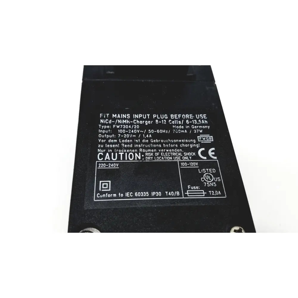 Black rectangular eds adaptor charger with white printed specifications and safety labels for reuse medical devices