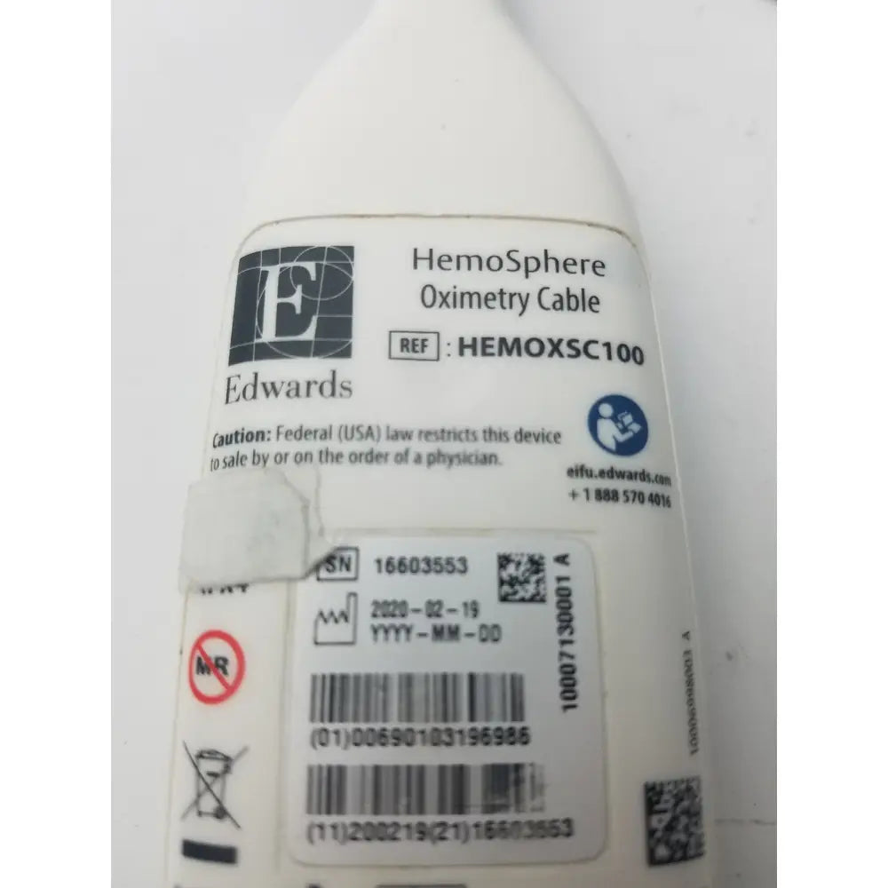 White plastic edwards hemosphere oximetry cable labeled hemosphere oximetry cable used for medical monitoring