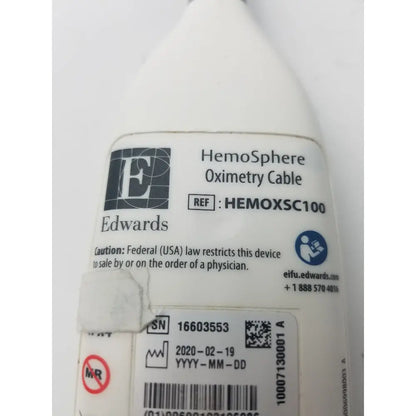 White plastic edwards hemosphere oximetry cable labeled hemosphere oximetry cable by edwards model HEMOXSC100