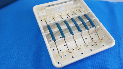White plastic tray with six blue-handled edwards life science perimount magnas ease aortic valve sizer instruments for buy used medical equipment