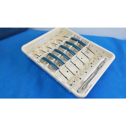White plastic dental tray holding blue-handled glass tip instruments from Edwards Life Science aortic valve sizer set for buy used medical equipment