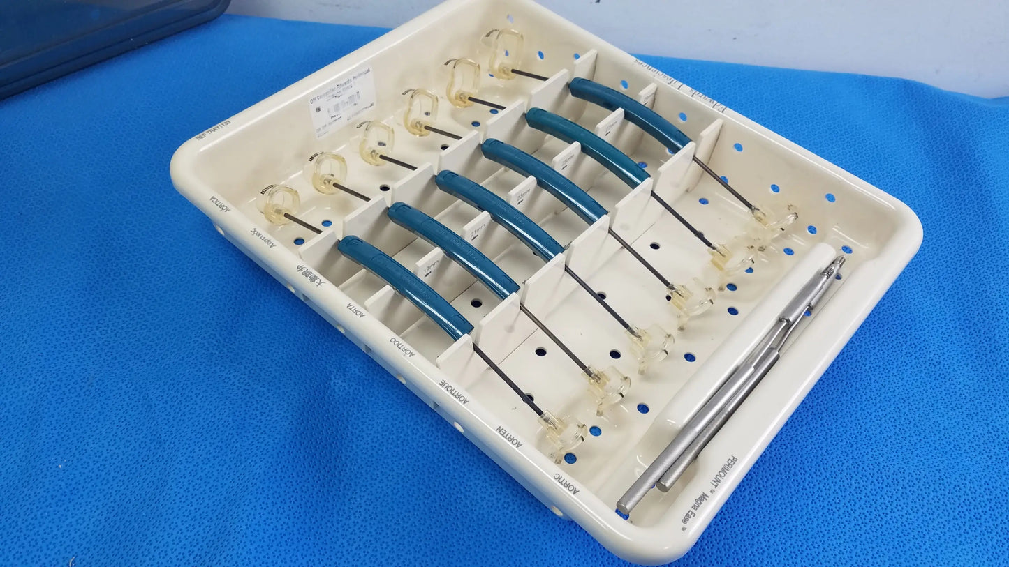 White plastic dental tray holding blue-handled glass tip instruments from Edwards Life Science aortic valve sizer set for buy used medical equipment