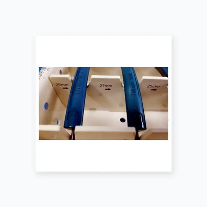 Blue plastic electrical circuit breakers with engraved size markings in edwards life science aortic valve sizer set for buy used medical equipment