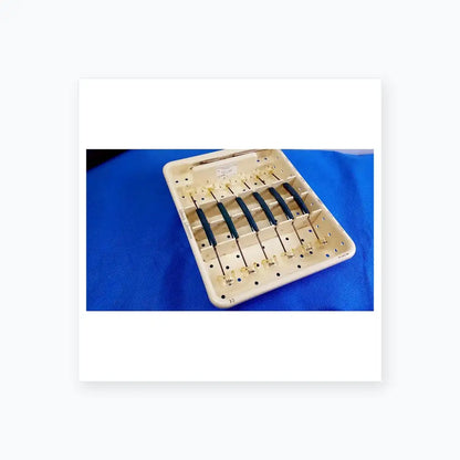 White plastic tray with six blue-handled edwards life science perimount magnas ease aortic valve sizer instruments for buy used medical equipment