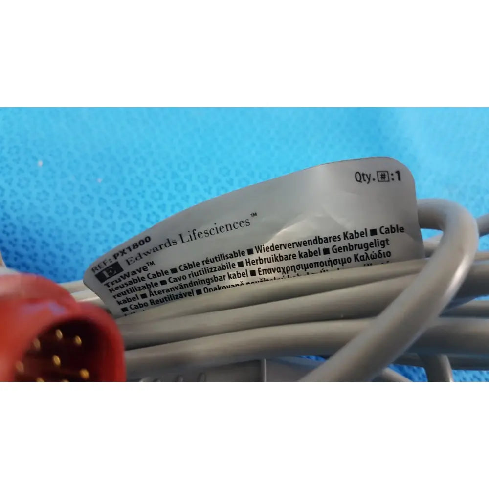 Gray reusable pressure monitoring cable with red connector labeled truwave by edwards lifesciences truwave px1800