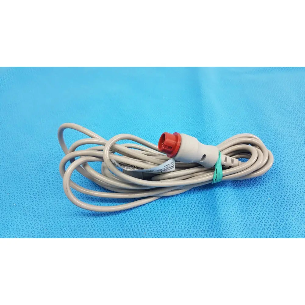 Gray medical cable with red connector and white housing secured by green tie edwards lifesciences truwave px1800 reusable