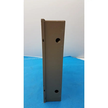 Gray metal electrical control panel enclosure with two circular holes and vertical edge profile for time delay relay use