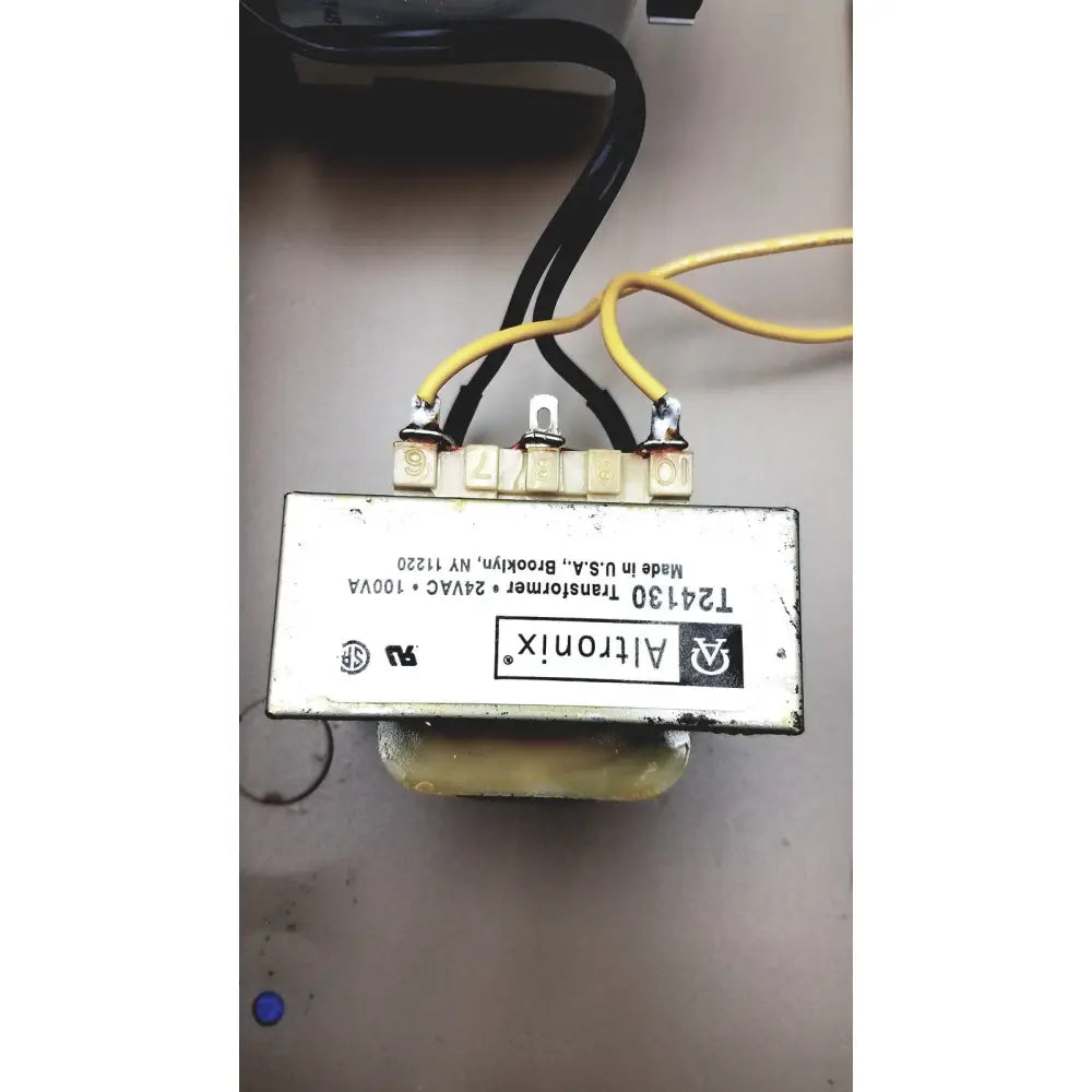 White altronix t24130 transformer with yellow and black wires in electrical control panel with time delay relay