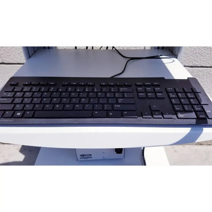 Black plastic keyboard with qwerty layout and usb cable for ellex eyecubed ultrasound biomicroscopy system as-is
