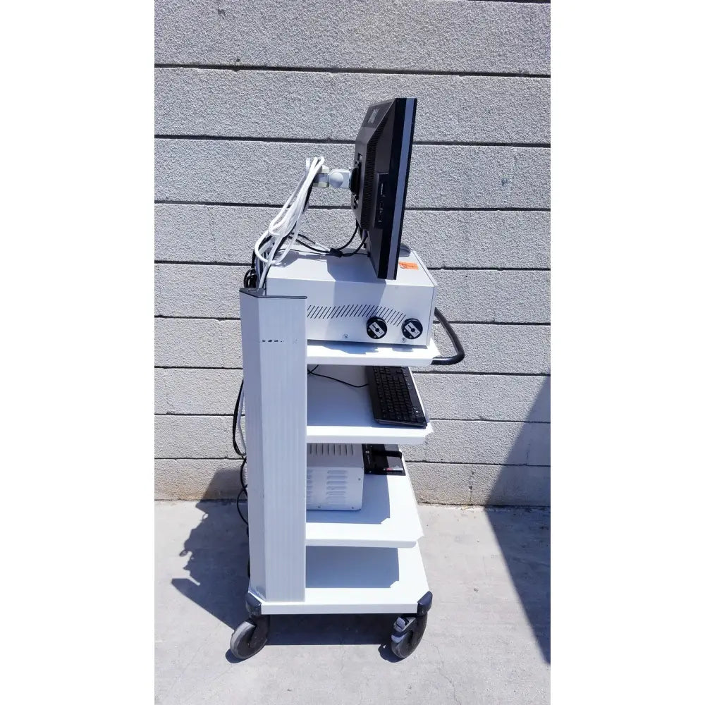 White medical cart with black monitor and keyboard for ellex eyecubed ultrasound biomicroscopy system with stand extras as-is