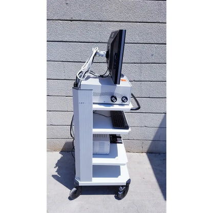 White medical cart with black monitor and keyboard for ellex eyecubed ultrasound biomicroscopy system with stand extras as-is
