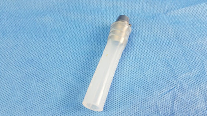 Transparent plastic ellik evacuator adapter with ridged tube and gray metallic cap compatible endoscopic systems
