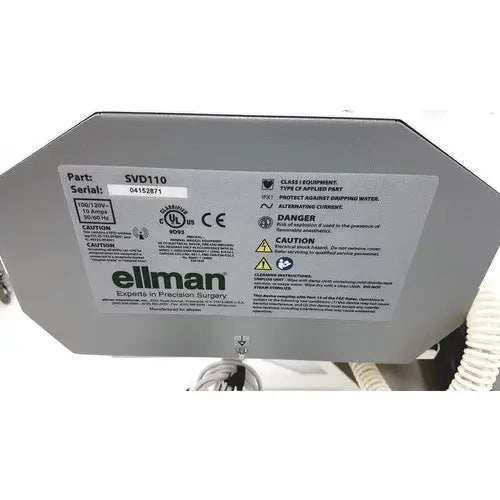 Gray metal backplate with white ellman label on the back side of surgical smoke evacuation system svd110 with stand
