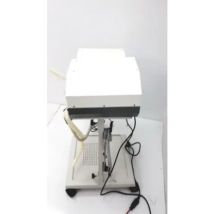 White Ellman Surg-e-Vac surgical smoke evacuation system with black accents and coiled cables for surgical smoke removal