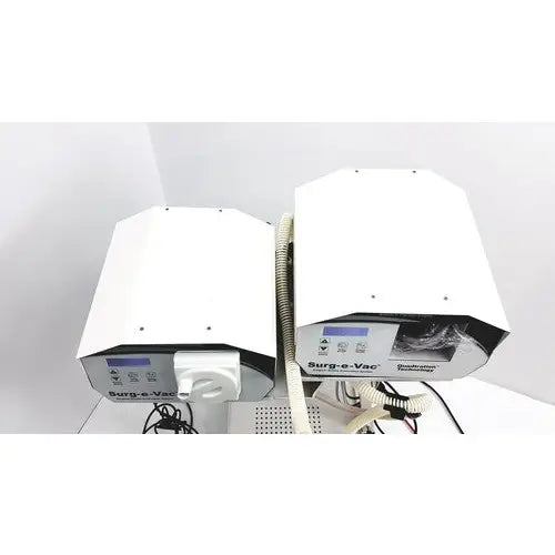 White Ellman Surg-e-Vac surgical smoke evacuation system with digital display and coiled tubing for surgical smoke removal