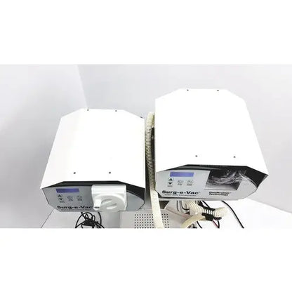 White Ellman Surg-e-Vac surgical smoke evacuation system with digital display and coiled tubing for surgical smoke removal