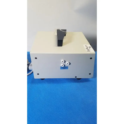 Beige rectangular ellman surgitron ffp emf electrosurgical unit with black gray handle and four circular ports labeled thermal control adapter only