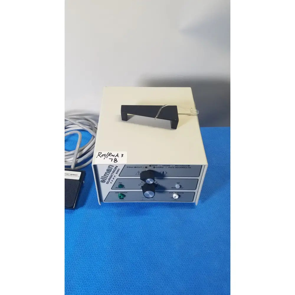 Beige ellman surgitron emc electrosurgical unit with black control knobs and handle for precise medical use