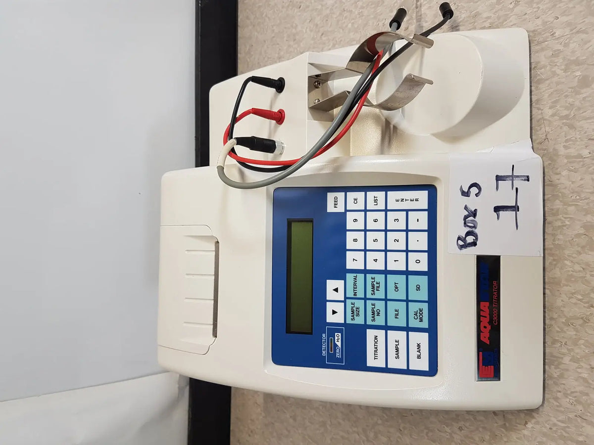 White plastic science hiranuma aquastar c3000 coulometric titrator with blue control panel and red black test leads
