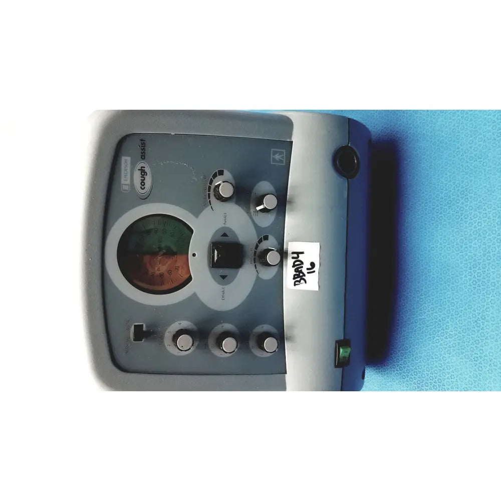 Gray and blue emerson ca3200 airflow unit featuring multiple control knobs, circular gauge, and green power indicator for hvac systems