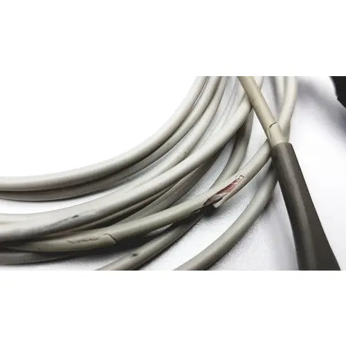 Coiled gray cable with dark brown connector and exposed wiring for the best fingertip sensors in your health journey