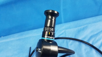 Black olympus enf-p4 fiber optic endoscope with textured grip and labeled control ring for rhino-laryngoscope use