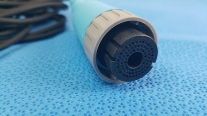 Light blue and beige plastic Ensite X EP catheter connector cable with black perforated nozzle for reuse medical equipment