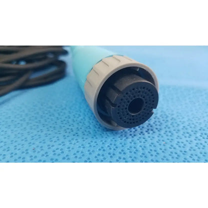 Light blue and beige plastic Ensite X EP catheter connector cable with black perforated nozzle for reuse medical equipment