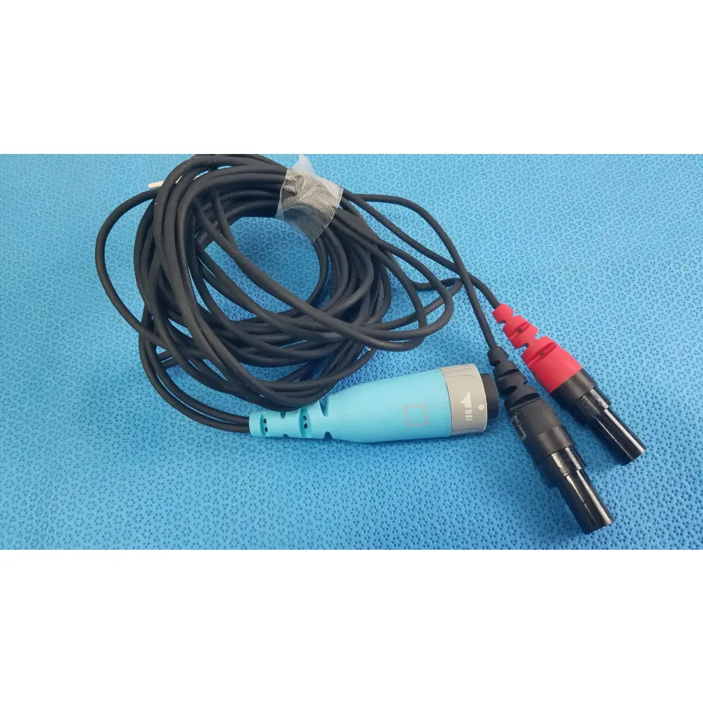 Black coiled catheter connector cable with light blue and gray housing and red capped bncs for reuse medical equipment