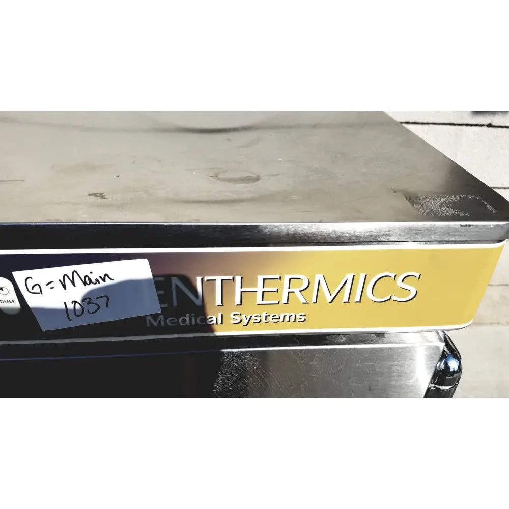 Stainless steel enthermics medical systems ec770 fluid warmer with yellow label for medical temperature control