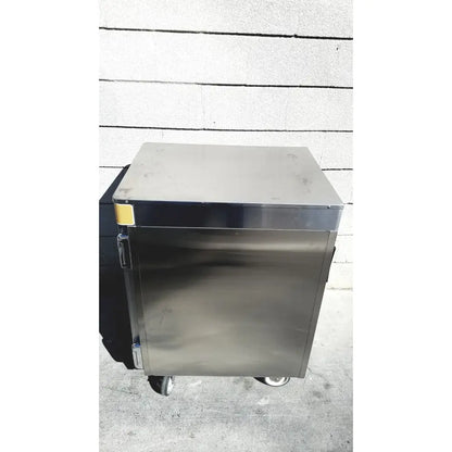 Stainless steel commercial food warmer on wheels with yellow label by enthermics medical systems ec770 fluid warmer