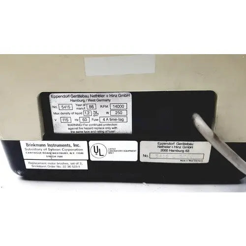Black rectangular label on the back of eppendorf refrigerated unit centrifuge 5415 with voltage rpm specs and ul certification