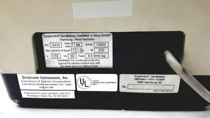 Black rectangular label on the back of eppendorf refrigerated unit centrifuge 5415 with voltage rpm specs and ul certification