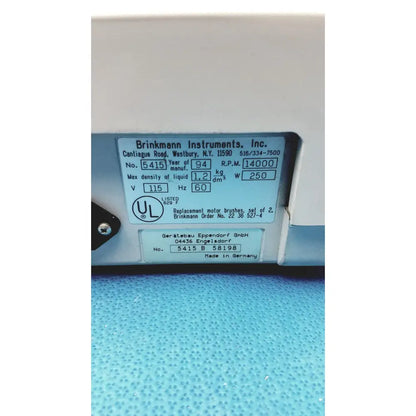 White plastic label with black text and ul mark showing technical specs for eppendorf centrifuge laboratory model w250