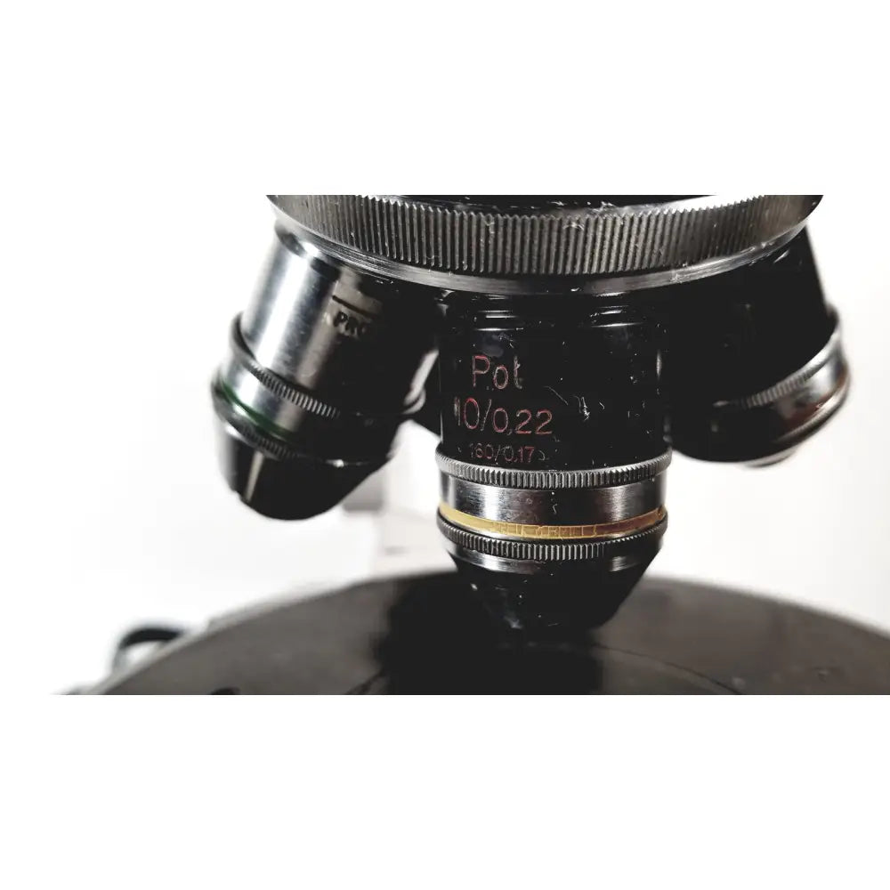 Black microscope objective lens with silver metallic rings and engraved markings for eppendorf centrifuge reuse medical use