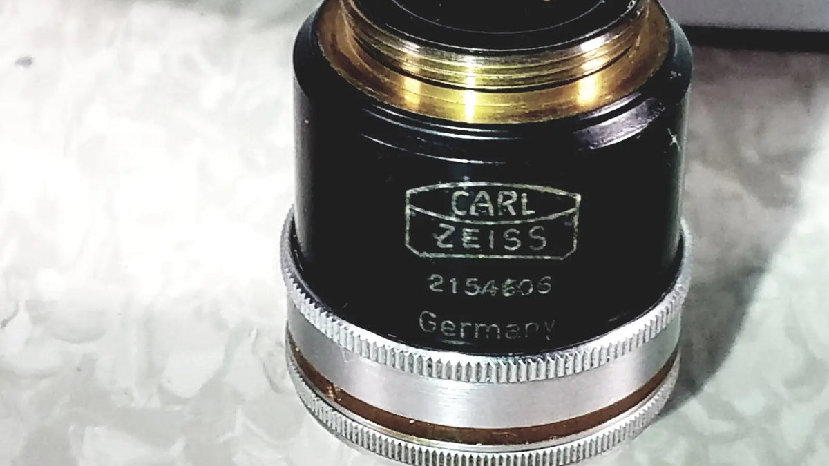 Black and silver carl zeiss microscope objective lens with gold mounting ring marked 2154606 germany for eppendorf centrifuge reuse medical