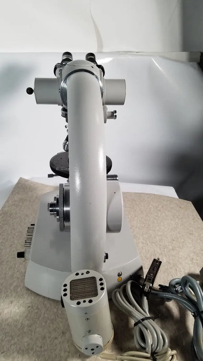 Gray metallic compound microscope with articulated arm and adjustable eyepieces for eppendorf centriifuge reuse medical use