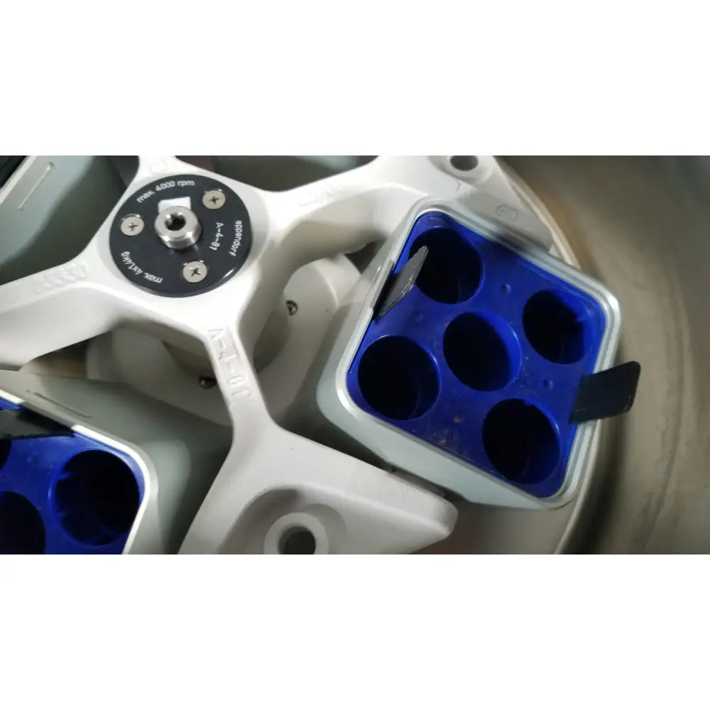Blue plastic centrifuge tube holder with white frame for eppendorf centriifuge model 5810 laboratory use