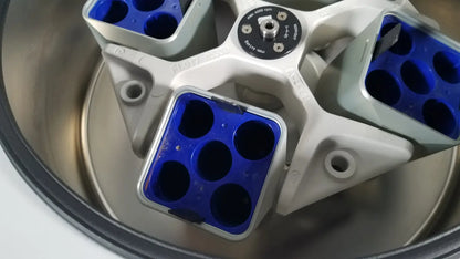 White and blue laboratory centrifuge rotor with six circular wells for reuse medical applications in eppendorf centriifuge model 5810