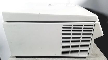 White laboratory eppendorf centriifuge model 5810 with hinged lid and vertical ventilation slats for reuse medical applications