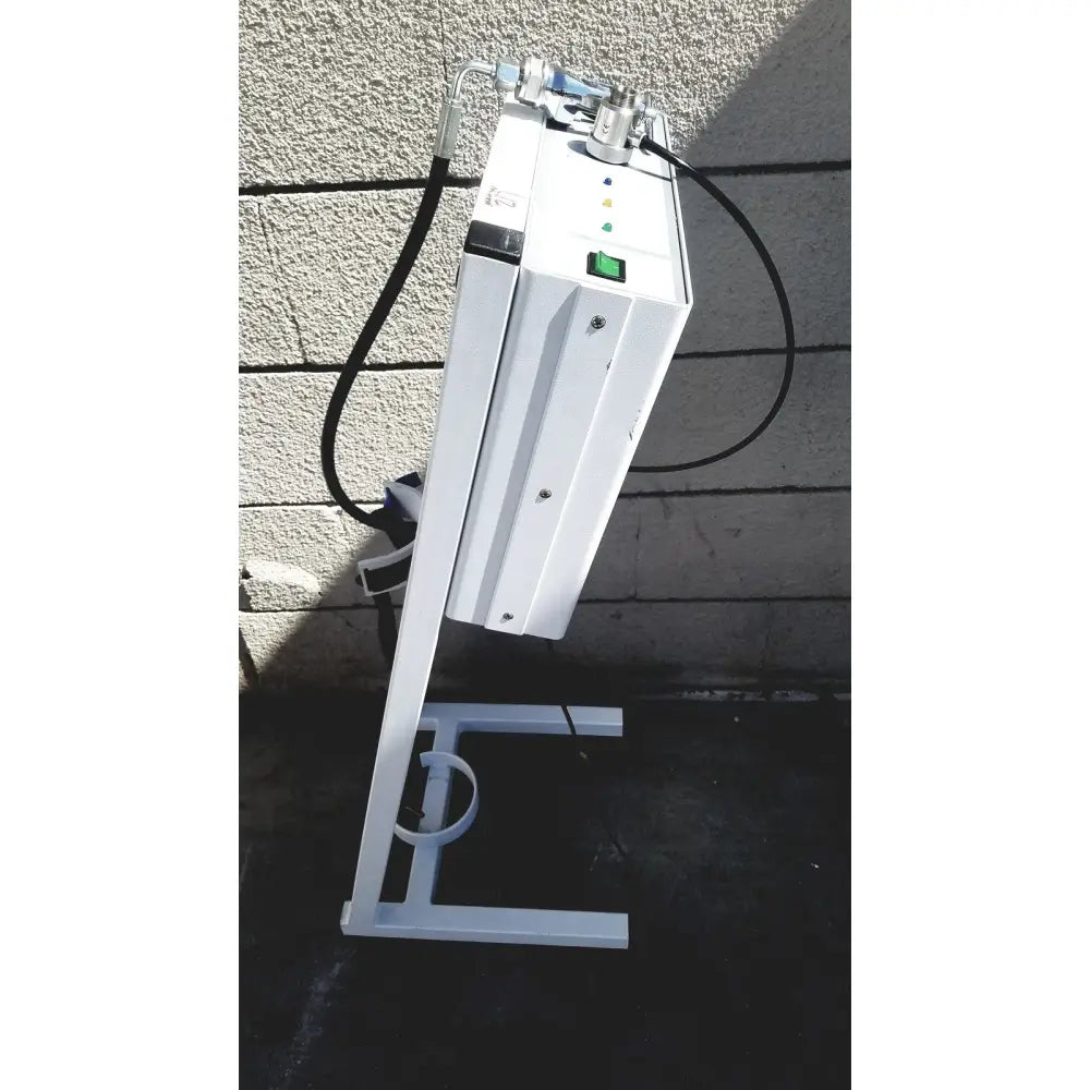 White industrial-grade erbe erbokryo cryosurgical unit with metallic components and black hoses including foot pedal