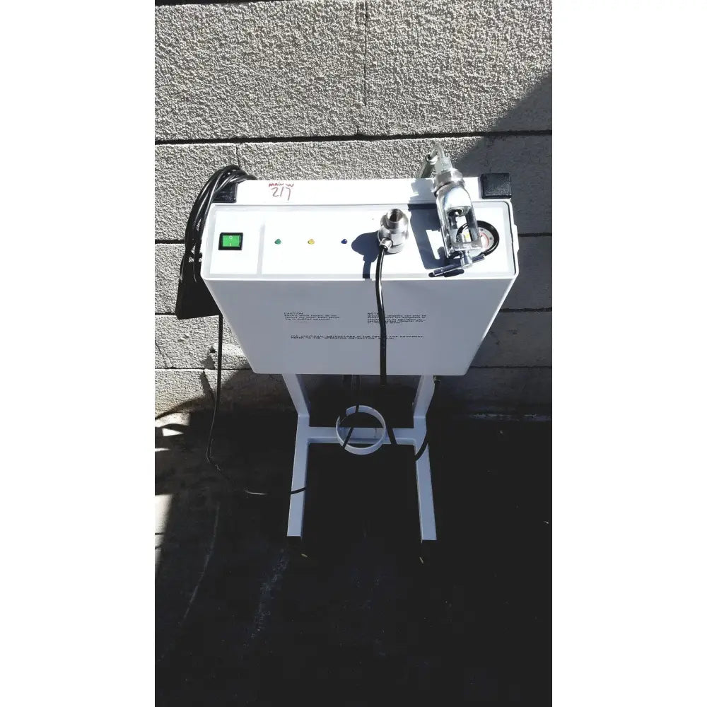 White industrial-grade erbe erbokryo cryosurgical unit with green power button and three indicator lights on metal stand