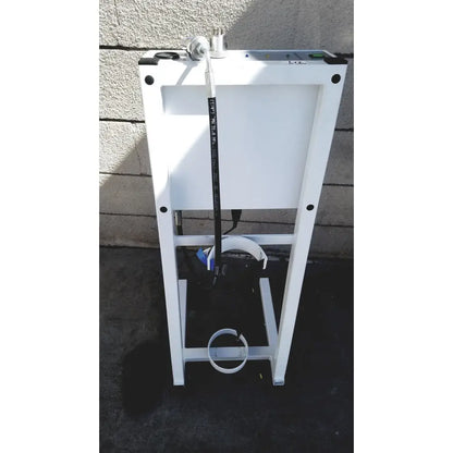 White metal stand with black tubing and silver fittings of erbe erbokryo cryosurgical unit with foot pedal