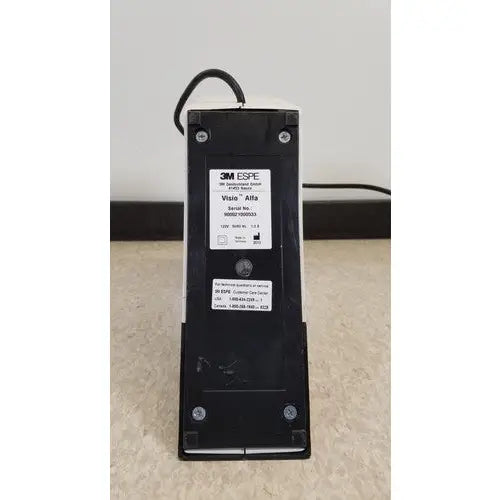 Black 3m espe visio alfa dental curing light unit 110v with white label and black power cord for visio alfa dental use