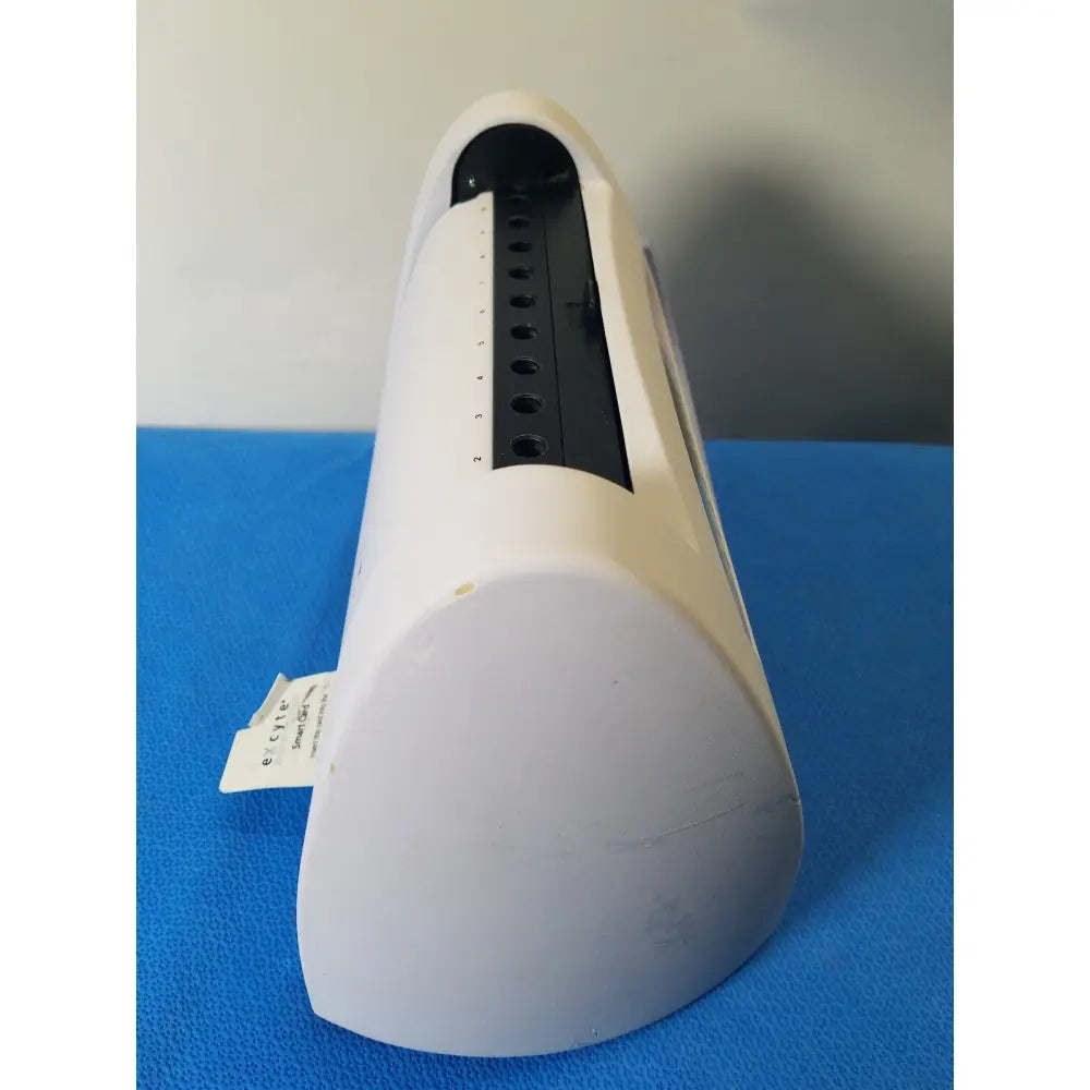 White plastic excyte m automated ESR analyzer with black slot and numbered guides for precise automated ESR testing