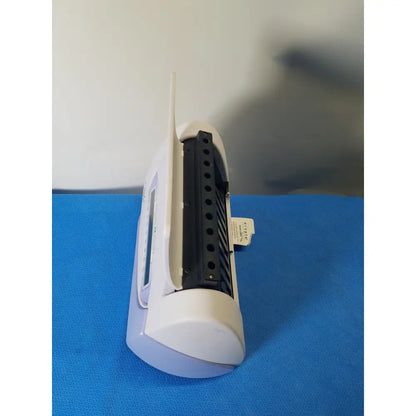 Excyte m automated esr analyzer featuring a white plastic wireless router with black ventilation slats and small antenna