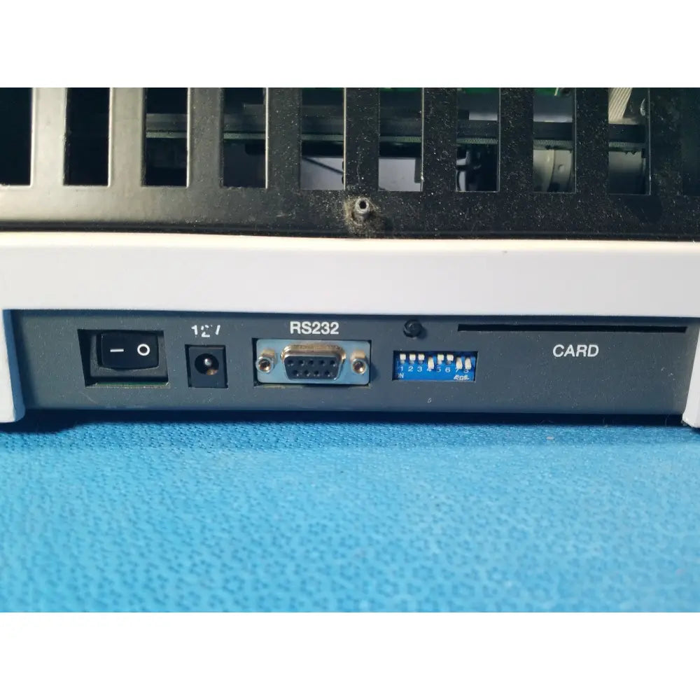 Black and white excyte m automated esr analyzer back with rs232 port power switch dc input and card slot