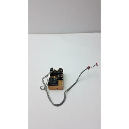 A beige compact electronic circuit board assembly with black components and gray wires for fasmedic dräger evita xl mechanical ventilator