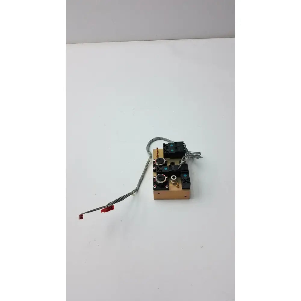 A compact evita xl mechanical ventilator module with a light brown wooden base and black plastic components by fasmedic dräger