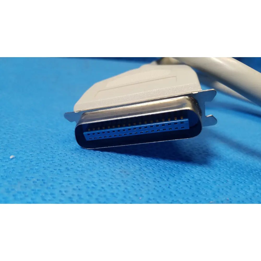 Beige and blue female connector external scsi cable with metallic housing db-25 connector for secure data connection